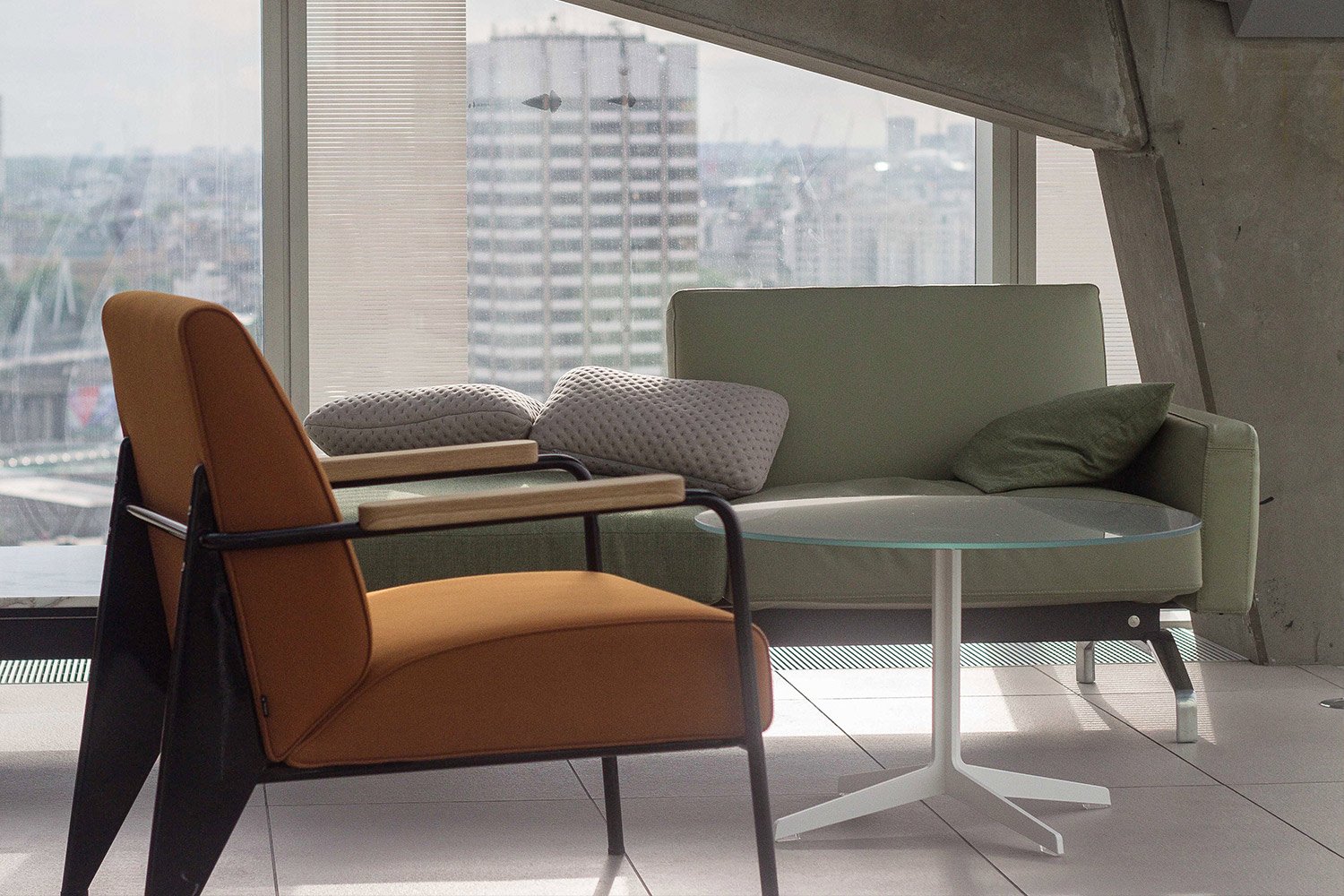 Interior photograph of retail banking modern desk and chairs